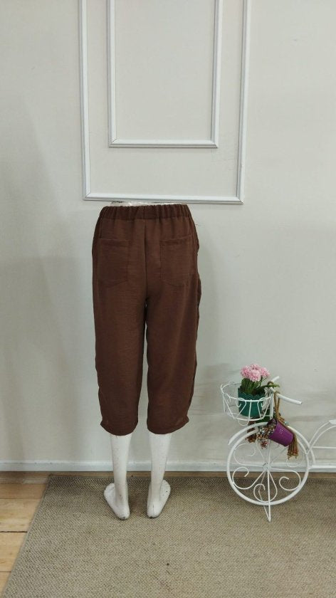 Pantaloni midi elastici cu talie înaltă pentru femei, cu nasturi laterali, 33562