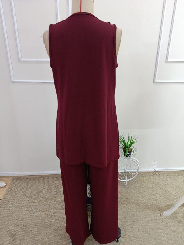 Compleu feminin fără mâneci, guler deschis, cu buzunare, veston și pantaloni din Janjan Krep, 36466