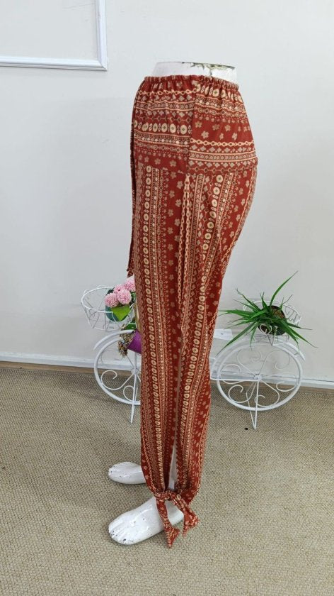 Pantaloni de damă cu talie înaltă, model, cu tiv cu legături și crăpături laterale, 33941