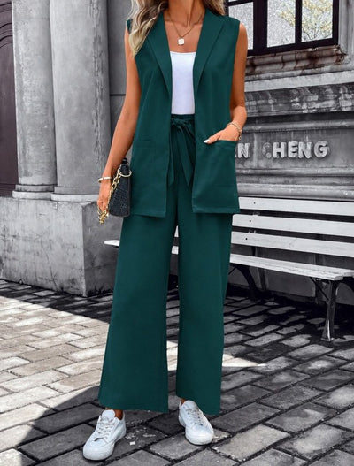 Compleu feminin fără mâneci, guler deschis, cu buzunare, veston și pantaloni din Janjan Krep, 36465
