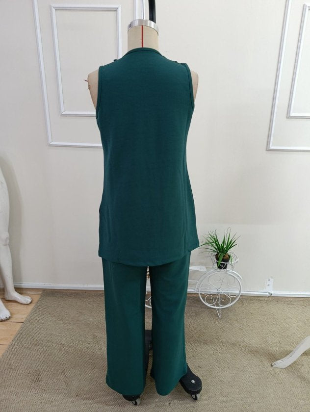 Compleu feminin fără mâneci, guler deschis, cu buzunare, veston și pantaloni din Janjan Krep, 36465