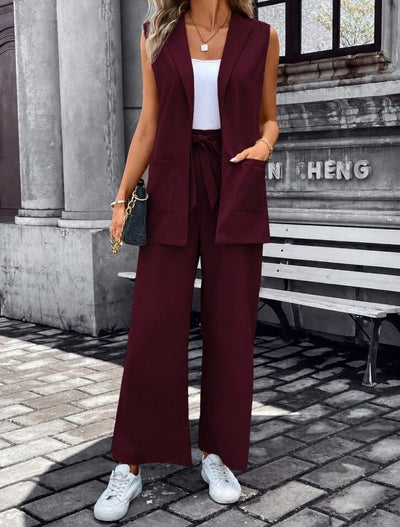 Compleu feminin fără mâneci, guler deschis, cu buzunare, veston și pantaloni din Janjan Krep, 36466