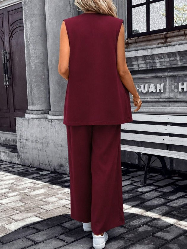 Compleu feminin fără mâneci, guler deschis, cu buzunare, veston și pantaloni din Janjan Krep, 36466