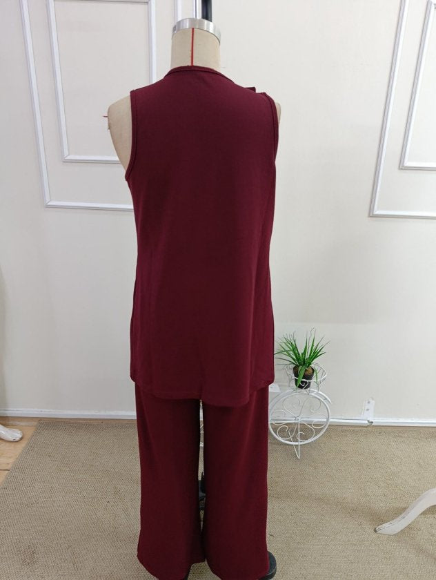 Compleu feminin fără mâneci, guler deschis, cu buzunare, veston și pantaloni din Janjan Krep, 36466