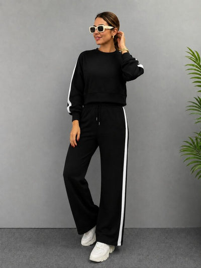 Set de două piese pentru femei - bluză scurtă din viscoză cu mâneci lungi, gât rotund și pantaloni, 37609