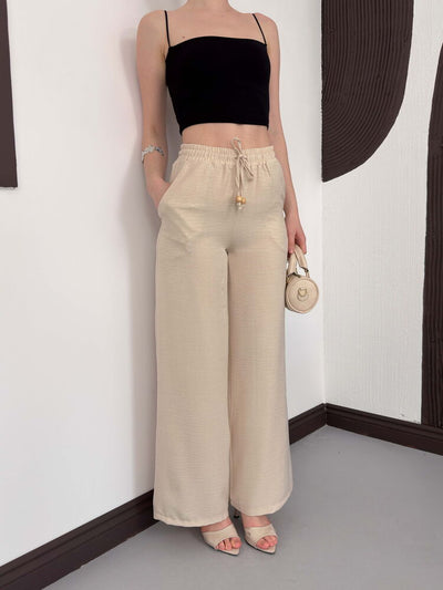 Pantaloni en-gros din lină Stone de la Topshow