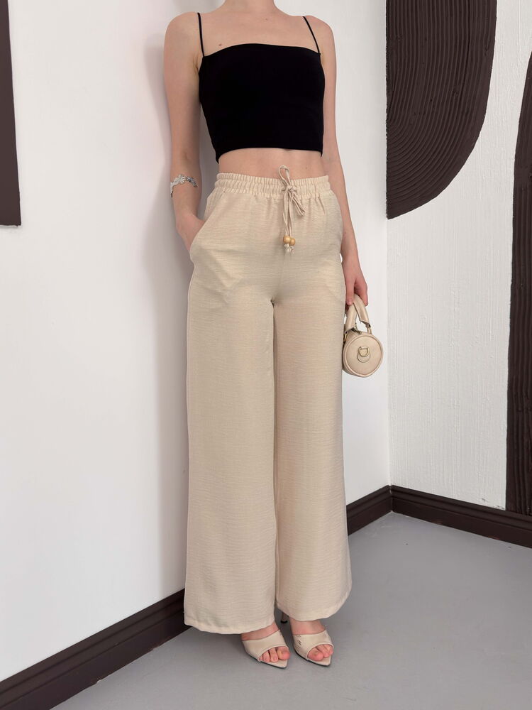Pantaloni en-gros din lină Stone de la Topshow