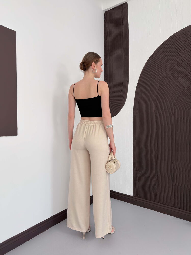 Pantaloni en-gros din lină Stone de la Topshow